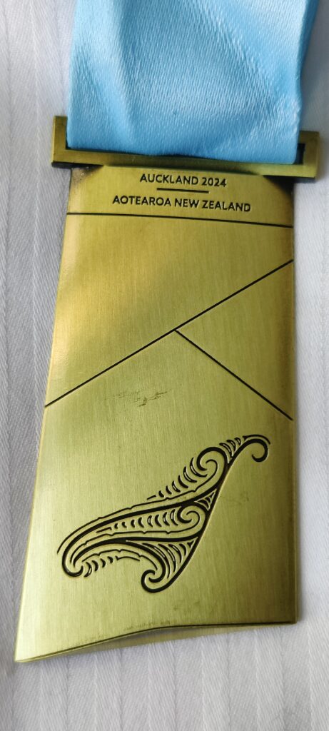 Back of My Gold Medal. Winner in Pop with Choreography, Choir of the World in the 2024 World Choir Games with The Young People's Chorus of NYC